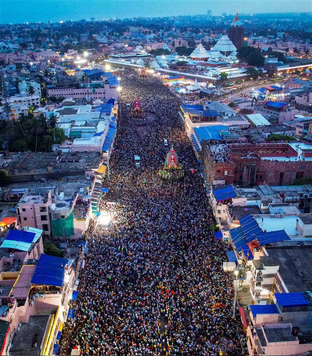 Devotees take part in the annual Rath Yatra, in Puri.