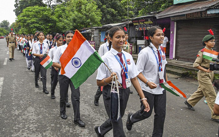 Sonitpur: Students participate in a 'tiranga yatra' as part of the Har Ghar Tiranga campaign, in Sonitpur district, Monday, Aug. 12, 2024.