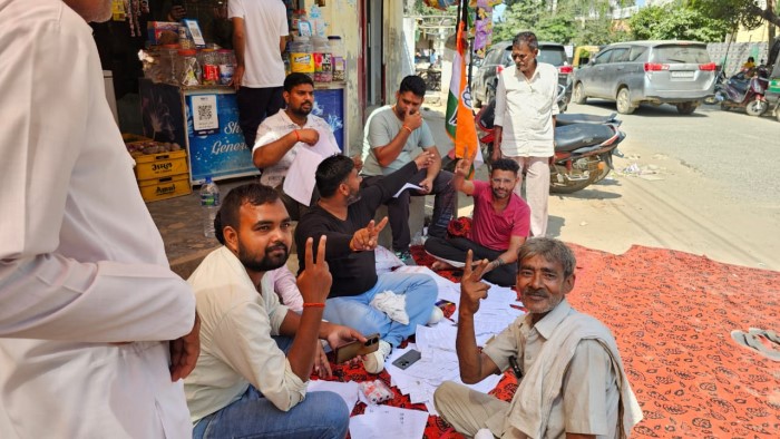 BJP workers shows victory symbol ahead of voting in Haryana Assembly Election 2024.