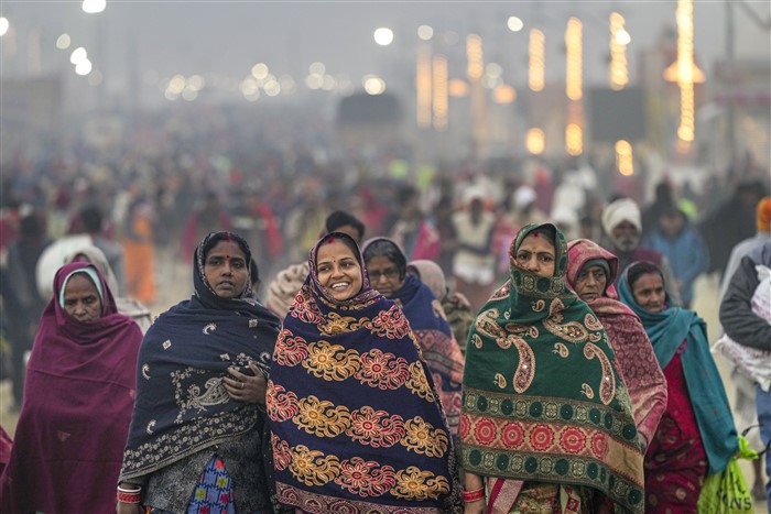 Devotees at the Sangam on the first day of Maha Kumbh Mela 2025, in Prayagraj, Uttar Pradesh, Monday, Jan. 13, 2025.