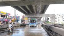கோவையில் அருவியாக மாறிய மேம்பாலம் ..  மேட்டுப்பாளையம் ஊட்டி செல்லும் வழியில் மாறிய காட்சி