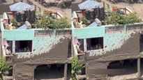 நேபாள பெருவெள்ளம்! சுற்றியிருந்த வீடுகள் எல்லாம் அடிச்சிட்டு போய்ட்டு! ஒரே ஒரு வீடு மட்டும் அசரலையே!