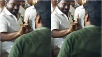 தீண்டாமை சுவரை அகற்ற.. அமைச்சரின் காலில் விழுந்த இளைஞர்! புத்தக கண்காட்சியில் சலசலப்பு!