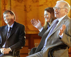 Warren Buffet with Bill Gates and Melinda Gates