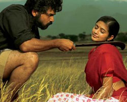 Priyamani with Karthi in Paruthi Veeran