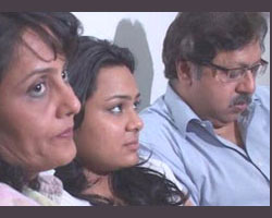 Prashant and Tilu Mangeshkar with daughter