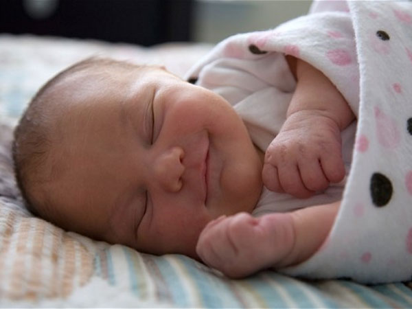 கனவு கண்டு சிரிக்கும்