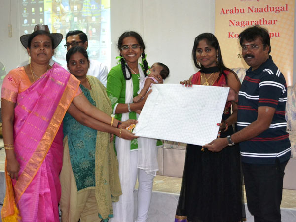 மனைவியுடன்