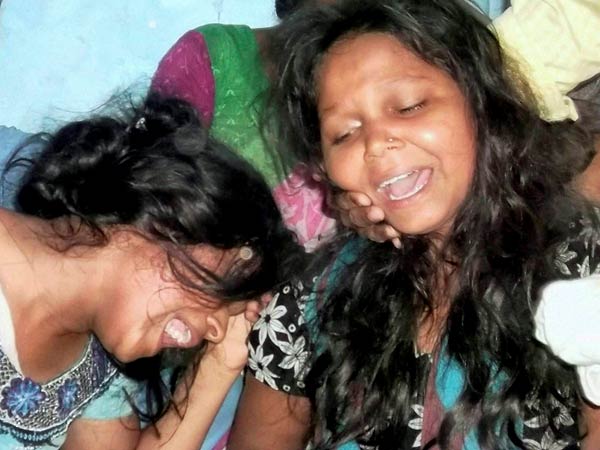  Family members of mid-day meal victims