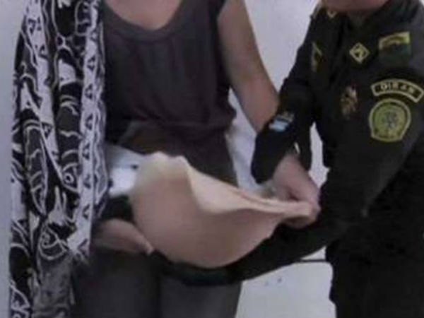 Woman caught smuggling drugs in fake belly