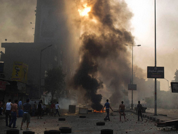 Clashes kill 13 as Morsi backers rally in Egypt