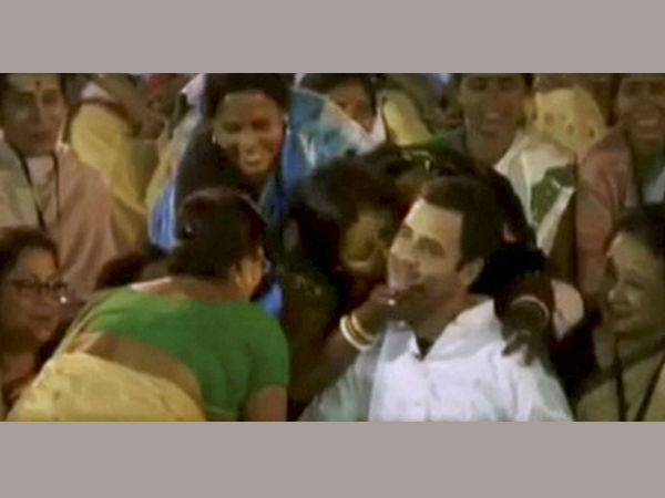 A surprise kiss for Rahul Gandhi on his tour of Assam