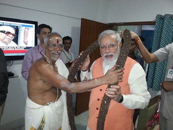 Is Kanchi Kamatchi Amman behind Modi's openness on his wife?