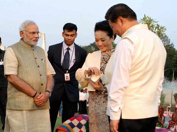 Narendra Modi gifts copy of Gita in Chinese to Xi Jinping at Sabarmati Ashram Narendra Modi gifts copy of Gita in Chinese to Xi Jinping at Sabarmati Ashram