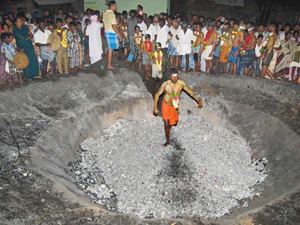 Muharram observed Hindus with a fire walk at Thiruppuvanam
