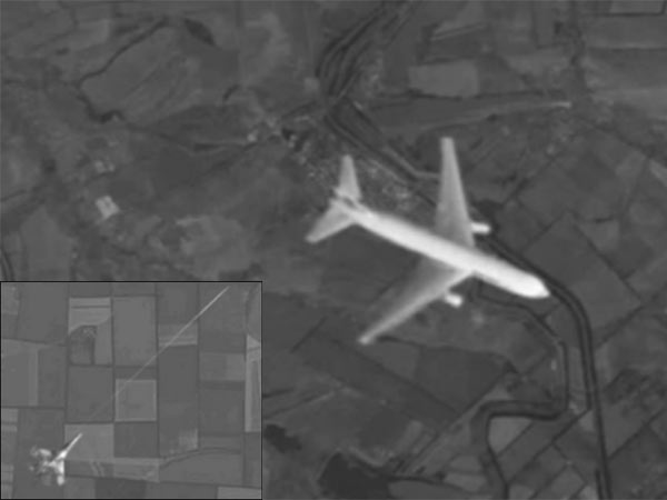 Russian TV channel says photos show MH17 shot down by fighter jet Russian TV channel says photos show MH17 shot down by fighter jet