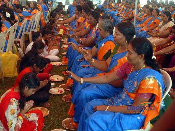 Students Perform Pada Pooja to Parents