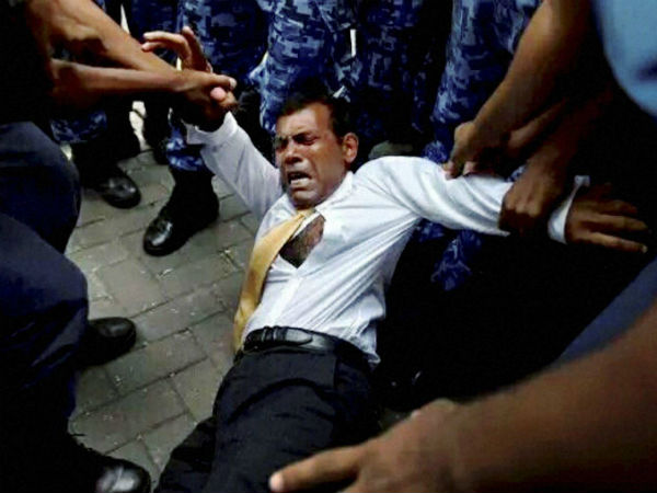 Maldives police drag former president into court Maldives police drag former president into court