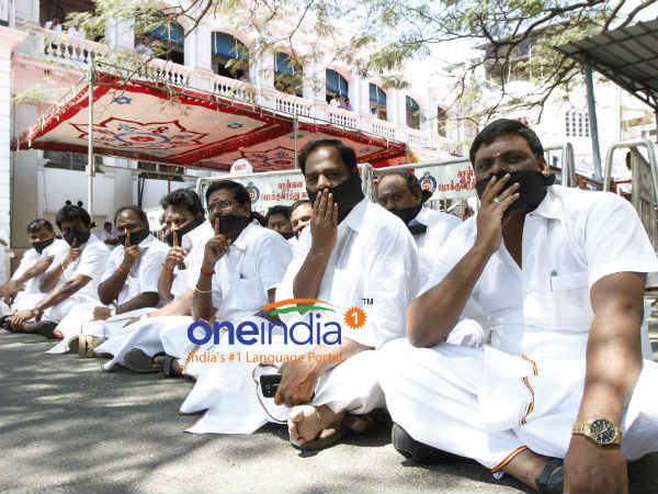 DMDK MLAs stage dharna in Assembly