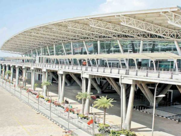 Glass section of door falls at airport, none injured Glass section of door falls at airport, none injured