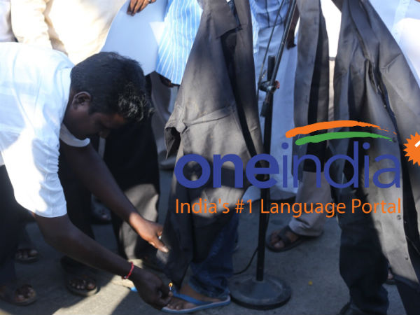 கறுப்பு சட்டை கிழிப்பு