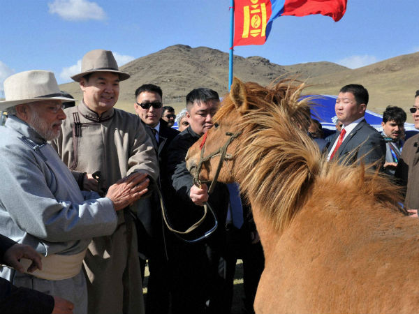 PM Narendra Modi presents 'ancient manuscript' to Mongolian Prez, gets 'horse' as parting gift