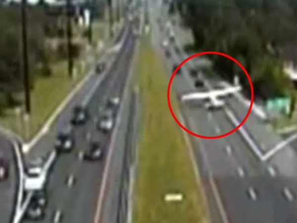 Police video shows plane landing on highway Police video shows plane landing on highway