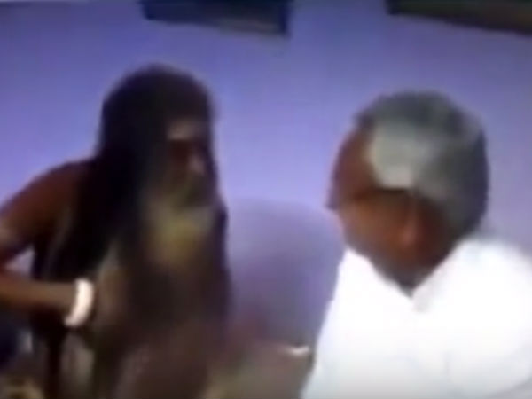 மந்திரவாதியுடன் நிதிஷ்குமார்