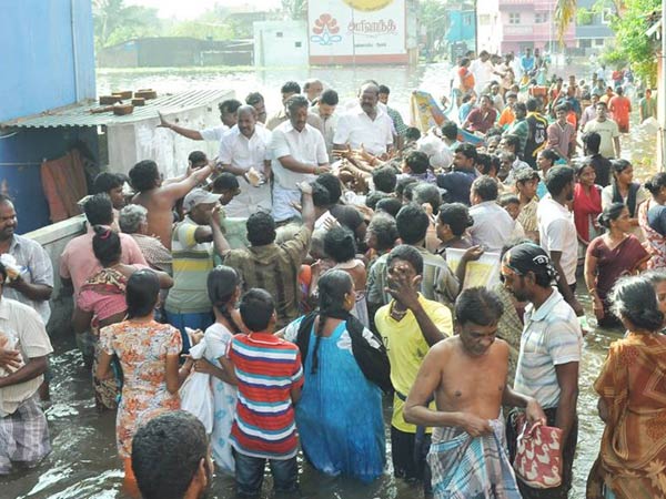 OPS distributes relief materials to flood-affected North Chennai
