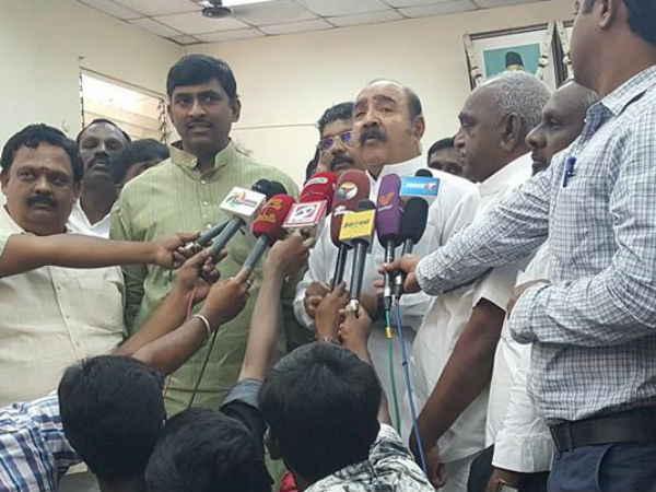 Actor Vijayakumar put tattoo the ADMK flag on his hand