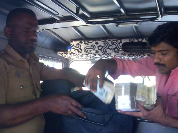 EC officials seizes Rs 8 lakhs near Kerala border