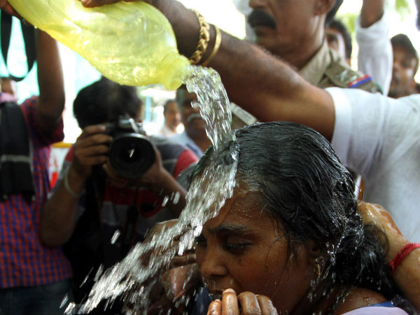 Woman Attempts Self-Immolation Outside Poes Garden Woman Attempts Self-Immolation Outside Poes Garden