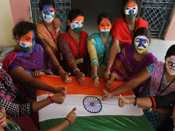 chennai college students, their faces painted with emblem of the Rio 2016