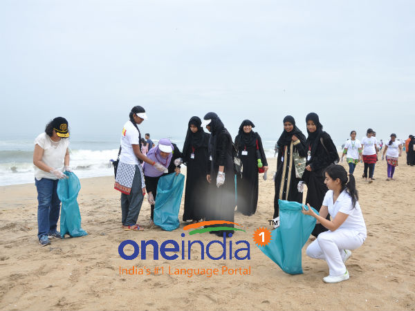 International Coastal Clean up Day: Navy, Coast Guard clean Marina Beach