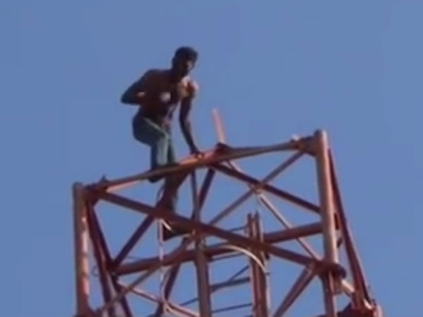 Admk Man climbed up cellphone tower for seat Admk Man climbed up cellphone tower for seat