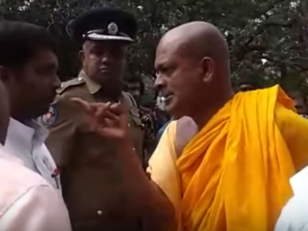 Buddhist Monk threats Tamil Grama Sevaka In Batticaloa Buddhist Monk threats Tamil Grama Sevaka In Batticaloa
