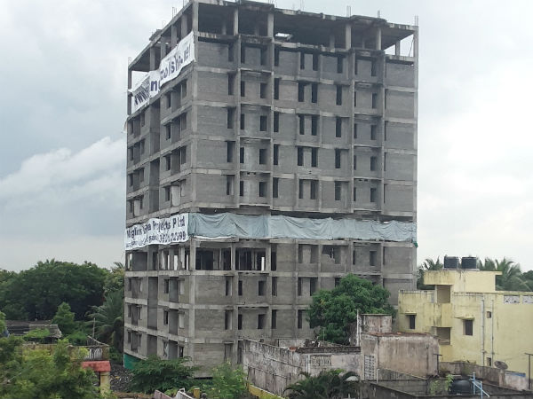 House holder returns back near 11 storey building House holder returns back near 11 storey building