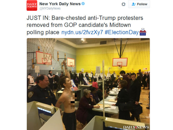 Bare-chested anti-Trump protesters removed from polling place Bare-chested anti-Trump protesters removed from polling place