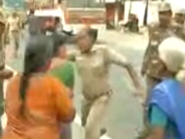 கன்னத்தில் அறைந்த போலீஸ் 