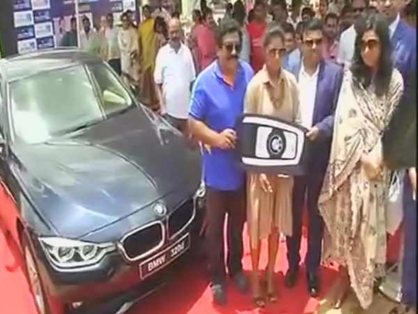 Mithali Raj presented BMW car by V Chamundeswaranath in Hyderabad Mithali Raj presented BMW car by V Chamundeswaranath in Hyderabad