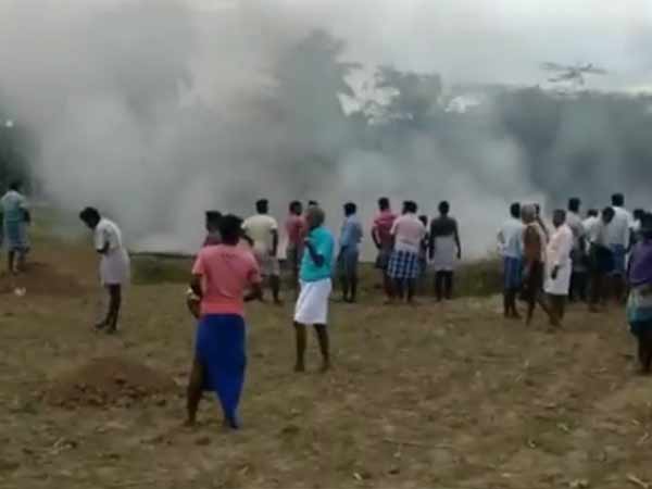  ONGC officials closing the fire accident waste yard dump at Nallandar kollai 