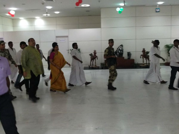 DMK workers arranged a small stage at the airport for Kanimozhi and Raja DMK workers arranged a small stage at the airport for Kanimozhi and Raja