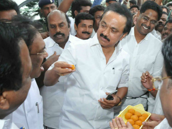 MK Stalin gave sweets for acquitting of Raja and Kanimozhi 