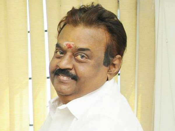 பயணி அருகில் அமர்ந்த விஜயகாந்த் 