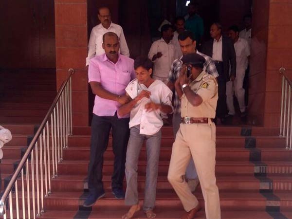 A man stabs Justice Vishwanath Shetty at Lokayukta office, in Bengaluru 