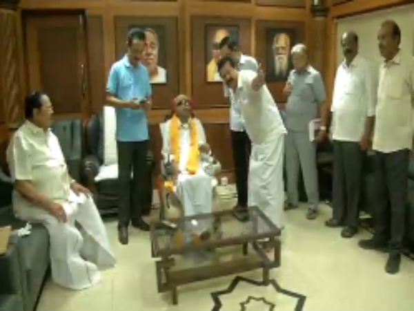 கன்னத்தை வருடி 