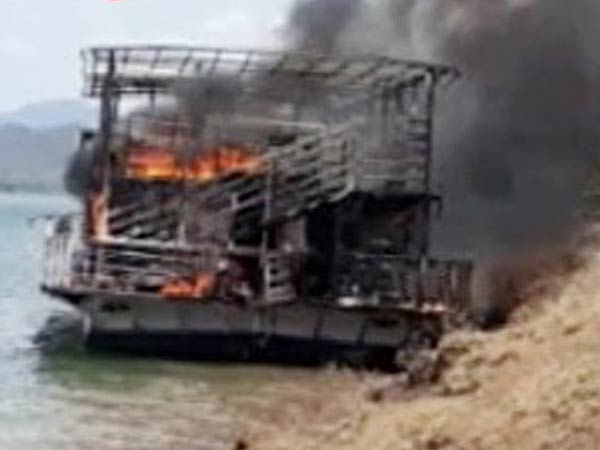 A Tourist boat got fire in Godavari river in Andhra 