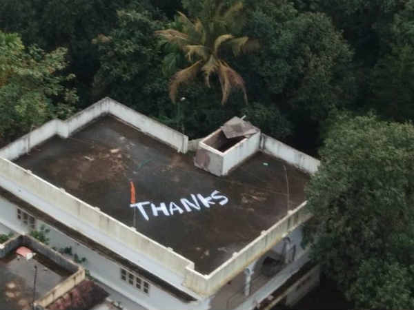 Kerala floods: Someone wrote a big Thanks on their rooftop in Kochi Kerala floods: Someone wrote a big Thanks on their rooftop in Kochi