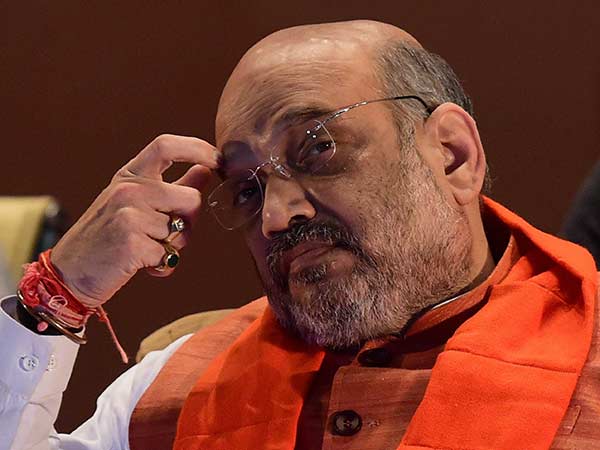 அமித்ஷா தப்பினார் 