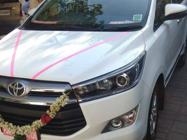 Innova car presented by ADMK to Madhusoodhanan 
